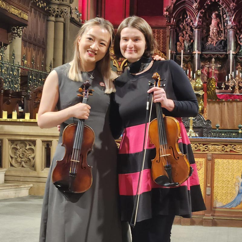 student taking violin lesson in Leeds